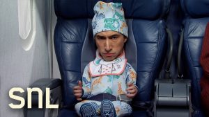 SNL: Dítě v letadle